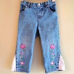 Embroidered light wash flare denim jeans